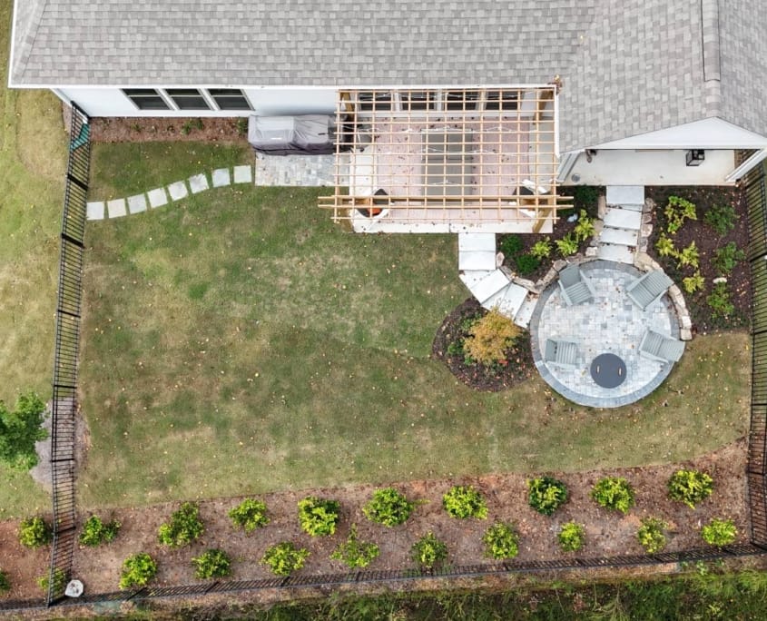 backyard patio and pergola with privacy trees