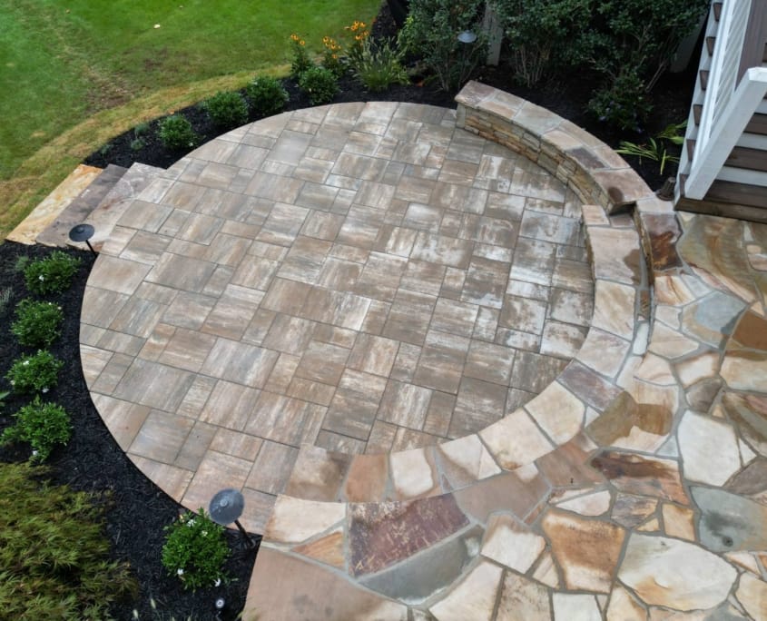 Patio surrounded by new sod with stone steps