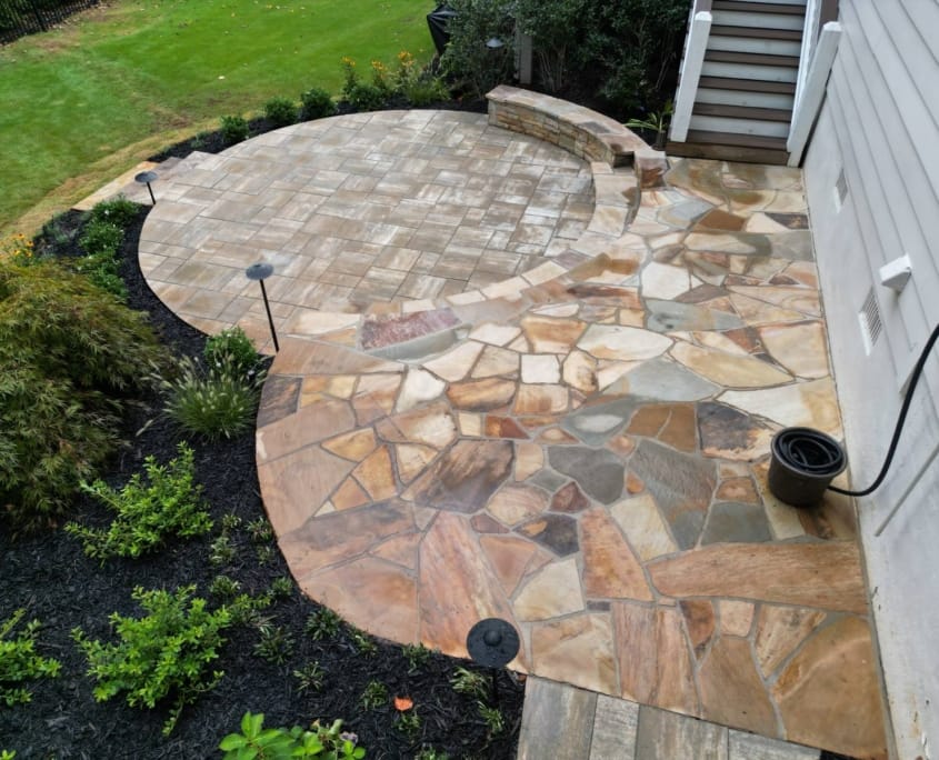 patio addition with new sod plantings and lighting